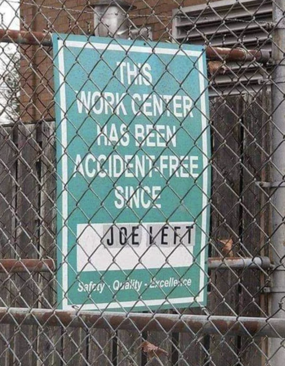 Building sign: "This work center has been accident-free since [filled in:] Joe left"