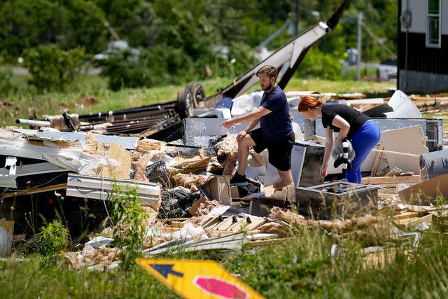 <p>George Walker IV/AP</p> Devin Johnson and Haley Loukota on Tuesday, May 28, 2024, in Barnsley Loop, Ky.