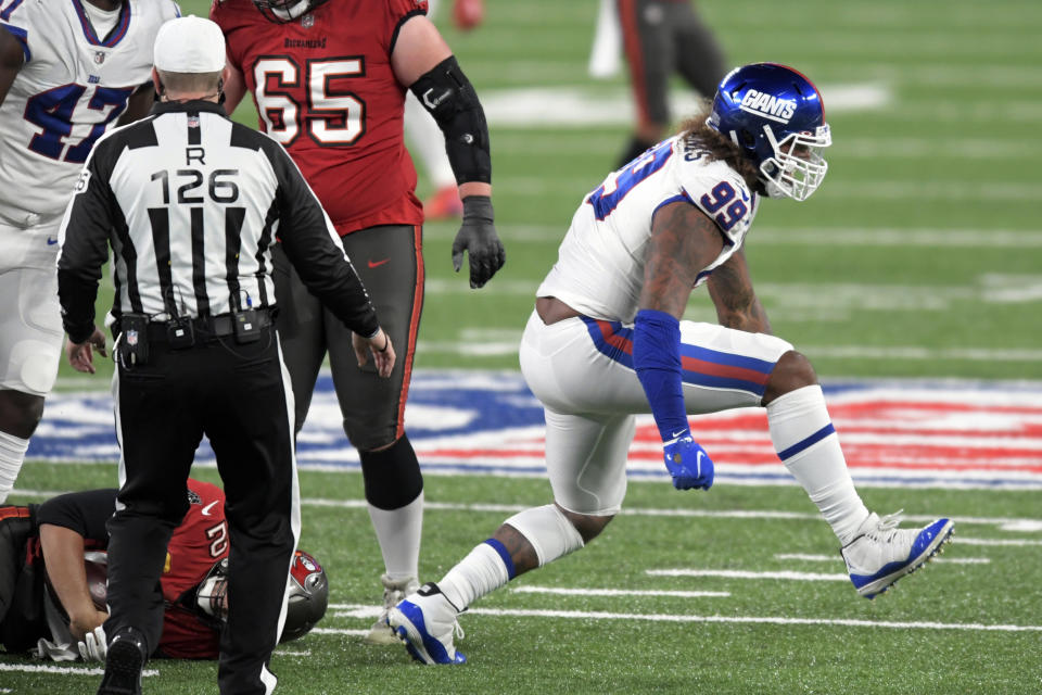 New York Giants' Leonard Williams, right, celebrates after sacking Tampa Bay Buccaneers quarterback Tom Brady during the first half of an NFL football game, Monday, Nov. 2, 2020, in East Rutherford, N.J. (AP Photo/Bill Kostroun)