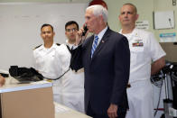 Vice President Mike Pence makes an announcement to the crew of the USNS Comfort while on a tour, Tuesday, June 18, 2019, in Miami. The hospital ship is scheduled to embark on a five-month medical assistance mission to Latin America and the Caribbean, including several countries struggling to absorb migrants from crisis-wracked Venezuela. (AP Photo/Lynne Sladky)