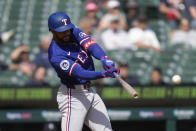 Texas Rangers' Leody Taveras hits a one-run single against the Detroit Tigers in the ninth inning of a baseball game, Thursday, April 18, 2024, in Detroit. (AP Photo/Paul Sancya)