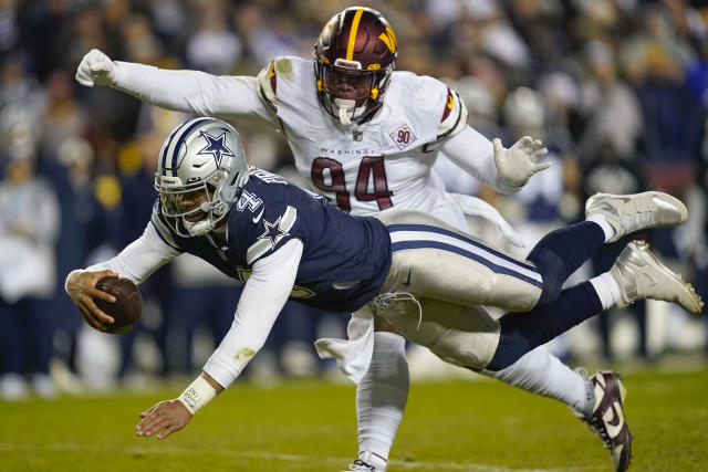 January 8, 2023 : Washington Commanders linebacker Khaleke Hudson (47)  applies pressure to Dallas Cowboys quarterback Dak Prescott (4) during the  game between the Dallas Cowboys and the Washington Commanders in Landover