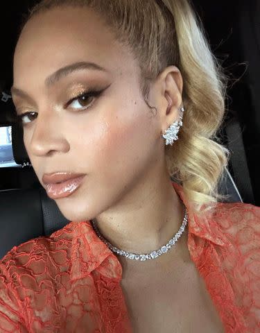 <p>Beyonce/Instagram</p> Beyoncé looked sensational in jewels and a full orange outfit