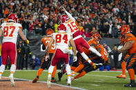 Kansas City Chiefs quarterback Patrick Mahomes (15) goes over the top to score a touchdown against the Cincinnati Bengals in the second half of an NFL football game in Cincinnati, Fla., Sunday, Dec. 4, 2022. (AP Photo/Jeff Dean)