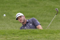 Taylor Pendrith hits from the sand on the sixth green during the final round of the Byron Nelson golf tournament in McKinney, Texas, Sunday, May 5, 2024. (AP Photo/LM Otero)