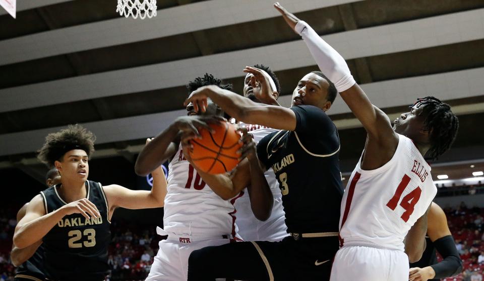 Alabama center Charles Bediako (10) and Oakland forward Micah Parrish fight for a rebound in Coleman Coliseum Friday, Nov. 19, 2021. [Staff Photo/Gary Cosby Jr.]