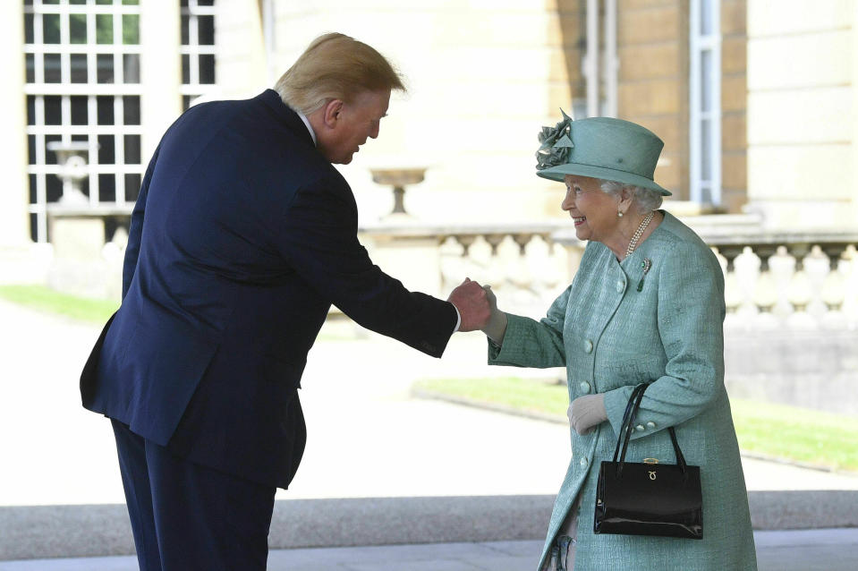 Britain's Queen Elizabeth II greets President Donald Trump as he arrives for a welcome ceremony in the garden of Buckingham Palace, in London, Monday, June 3, 2019, on the first day of a three day state visit to Britain. (Photo: Victoria Jones/Pool via AP)