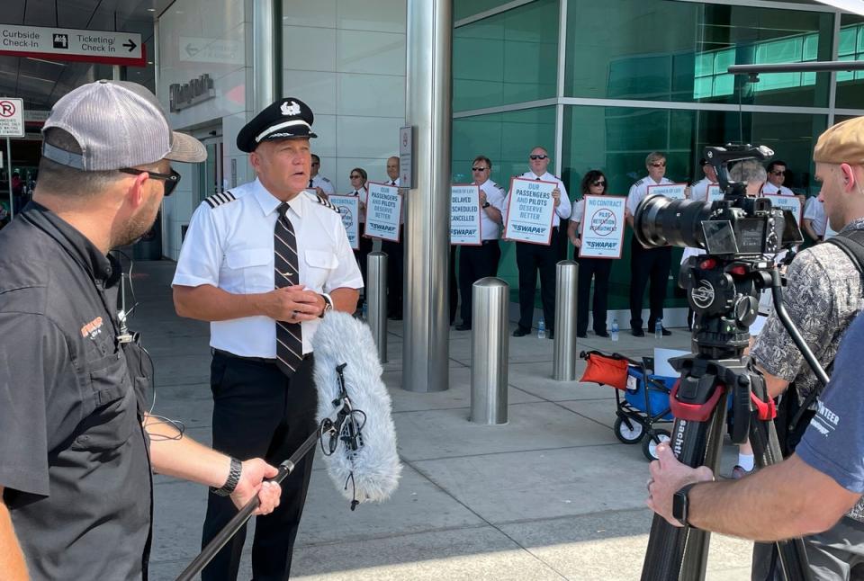 Casey A Murray, a pilot and the president of the Southwest Airlines Pilots Association, addressing media during picketing (AP)