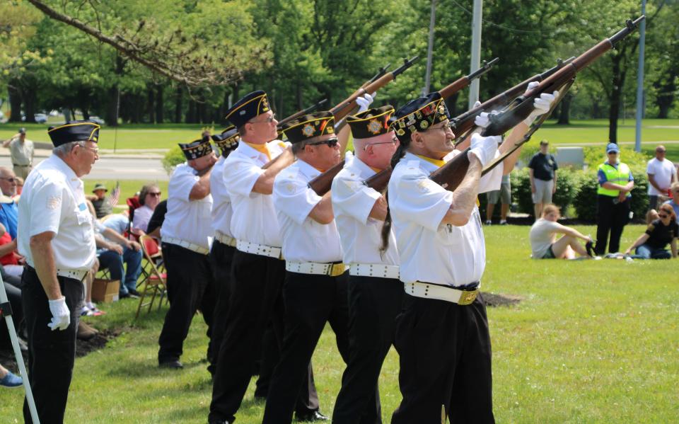 The Marion County Veterans Council Rifle Squad fires off a 21-gun salute during the Memorial Day ceremony held Monday, May 29, 2023, at Veterans Memorial Park in Marion. A large crowd gathered to honor local military veterans who have given their lives in service to the United States. U.S. Navy veteran Petty Officer 3rd Class Kenneth Belk delivered the keynote address at the ceremony.