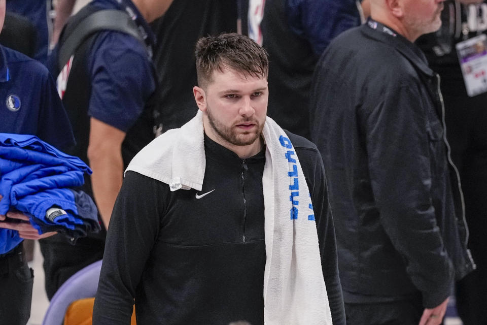 Dallas Mavericks guard Luka Doncic heads to the lockers after Game 3 of the NBA Basketball Finals against the Boston Celtics, Wednesday, June 12, 2024, in Dallas.  The Celtics won 106-99.  (AP Photo/Sam Hodde)