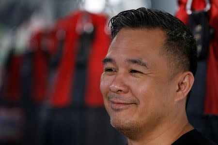 Ken Lee, MMA fighter Angela Lee's father and coach, speaks to Reuters during an interview in Singapore May 18, 2017. REUTERS/Yong Teck Lim