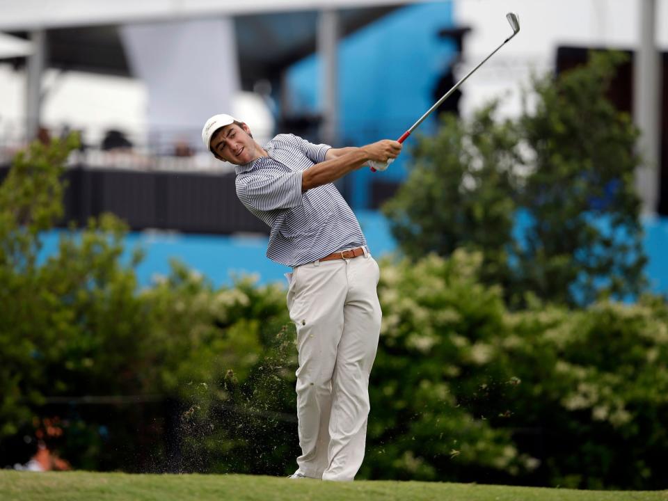 Scottie Scheffler plays a shot at the Byron Nelson Championship while still in high school.