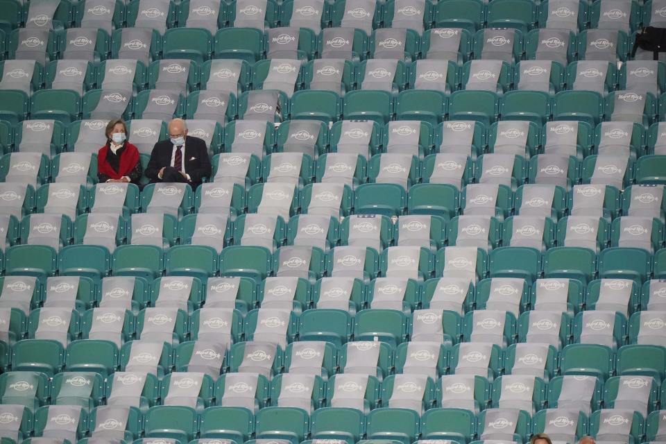 Fans watches during warm ups before an NCAA College Football Playoff national championship game between Alabama and Ohio State, Monday, Jan. 11, 2021, in Miami Gardens, Fla. (AP Photo/Wilfredo Lee)