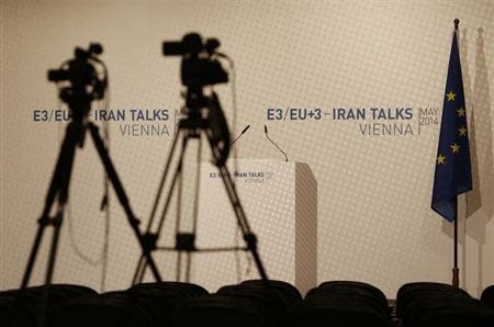 Video cameras are set up for the start of a news conference at the United Nations headquarters building (Vienna International Center) in Vienna May 14, 2014. REUTERS/Leonhard Foeger