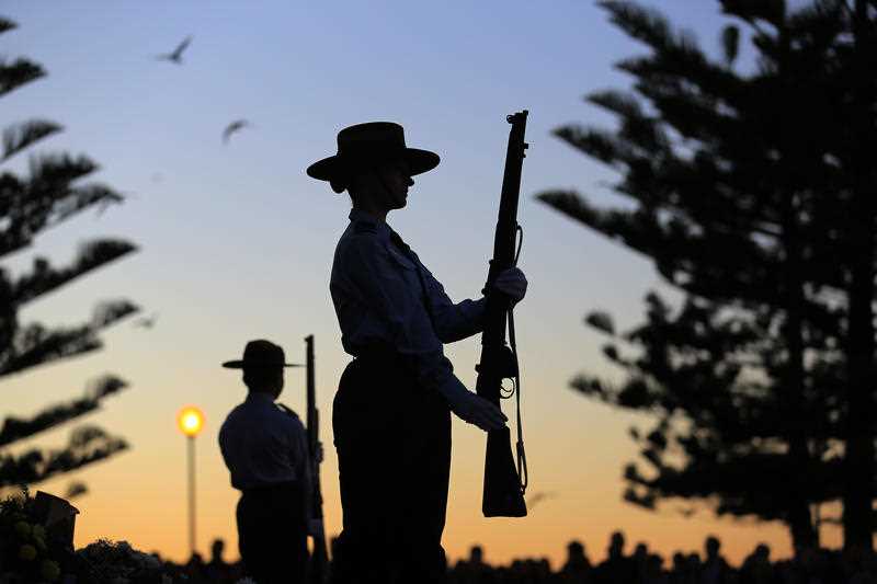 Members of the 324 Squadron stand in formation during the ANZAC Day Dawn Service at Coogee Beach in Sydney.