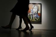 FILE PHOTO: Picasso painting "Femme au chien" is displayed at Sotheby's during a press preview of their upcoming impressionist and modern art sale in New York