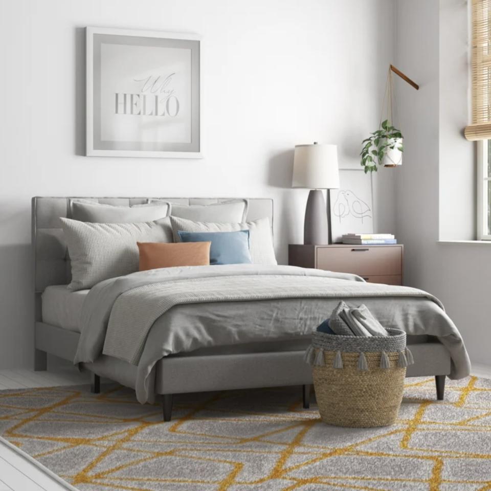 Give your bedroom a contemporary upgrade with this platform bed that has a panel headboard and grid tuft detailing. <br /><br /><strong>Promising review:</strong> "I slept great last night in my new bed! <strong>I love the design and putting it together was super easy.</strong> I thought it was neat that some of the pieces were zipped up into the headboard. Now that that&rsquo;s empty it could be a neat little hiding spot. Very pleased with my purchase." &mdash; <a href="https://go.skimresources.com?id=38395X987171&amp;xs=1&amp;xcust=-HPWayDaySale4-28-21-60896f93e4b09cce6c197126&amp;url=https%3A%2F%2Fwww.wayfair.com%2Ffurniture%2Fpdp%2Fzipcode-design-aquilla-tufted-upholstered-platform-bed-w004281837.html%3Fcjevent%3D4865332da84c11eb826b000d0a82b820%26refID%3DCJ1615998-CJ4839372%26PID%3DCJ8209452%26clickid%3D4865332da84c11eb826b000d0a82b820" target="_blank" rel="noopener noreferrer">Vivian</a><br /><br /><strong>Price:</strong> <a href="https://go.skimresources.com?id=38395X987171&amp;xs=1&amp;xcust=-HPWayDaySale4-28-21-60896f93e4b09cce6c197126&amp;url=https%3A%2F%2Fwww.wayfair.com%2Ffurniture%2Fpdp%2Fzipcode-design-aquilla-tufted-upholstered-platform-bed-w004281837.html%3Fcjevent%3D4865332da84c11eb826b000d0a82b820%26refID%3DCJ1615998-CJ4839372%26PID%3DCJ8209452%26clickid%3D4865332da84c11eb826b000d0a82b820" target="_blank" rel="noopener noreferrer">$179.99</a> (originally $300)<br /><br /><i>See more bedroom furniture for <a href="https://go.skimresources.com?id=38395X987171&amp;xs=1&amp;xcust=-HPWayDaySale4-28-21-60896f93e4b09cce6c197126&amp;url=https%3A%2F%2Fwww.wayfair.com%2Ffurniture%2Fcat%2Fbedroom-furniture-sale-c1851578.html" target="_blank" rel="noopener noreferrer">up to 80% off</a>. </i>