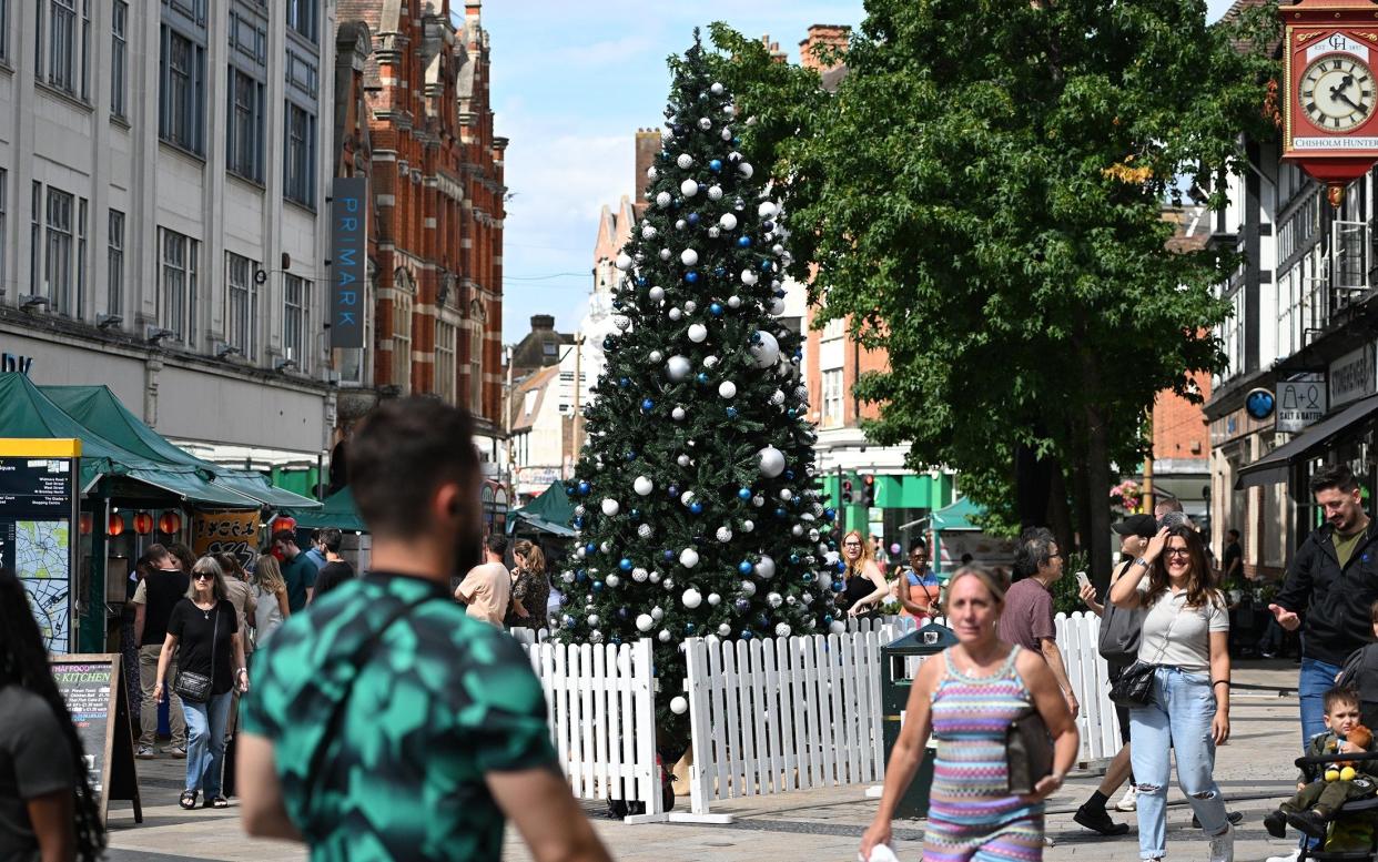 Shoppers were surprised to see the Christmas tree, complete with baubles' appear in Bromley while 'everyone is walking around in t-shirts'