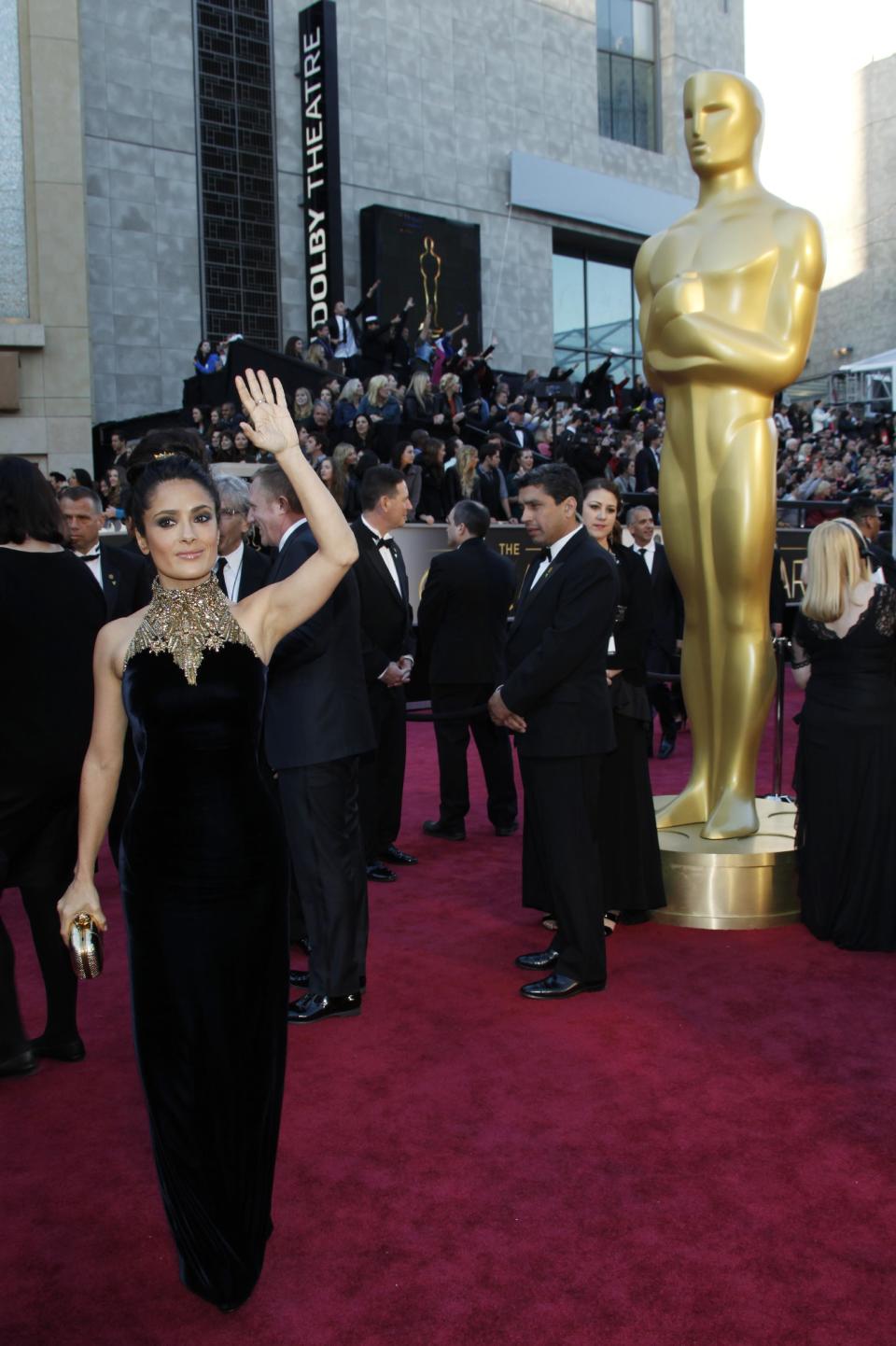Actress Salma Hayek arrives at the Oscars at the Dolby Theatre on Sunday Feb. 24, 2013, in Los Angeles. (Photo by Carlo Allegri/Invision/AP)