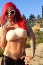 Celebrity photos: Jodie Marsh decided to strip off to just a tiny boob tube for her latest Twitter photo-shoot. The glamour model tweeted this picture along with the caption: “And another one for you on this lovely morning :-) bit nippy #badass” [sic]