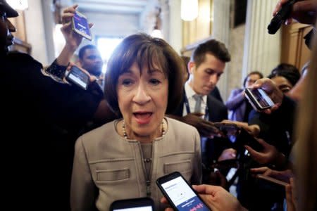 U.S. Senator Susan Collins (R-ME) talks with reporters after announcing that she will vote to confirm Supreme Court nominee nominee judge Brett Kavanaugh in a speech on the Senate floor on Capitol Hill in Washington, U.S., October 5, 2018. REUTERS/Yuri Gripas