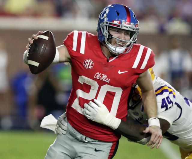 Shea Patterson is transferring to Michigan after two seasons at Ole Miss. (AP Photo/Rogelio V. Solis)