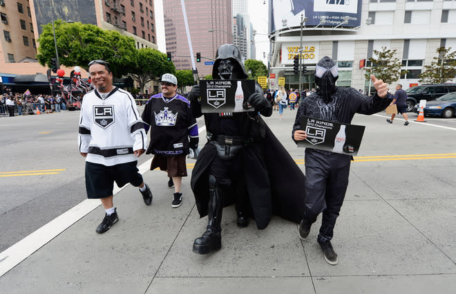 LOS ANGELES, CA - JUNE 14: People dressed as Darth Vader and Spiderman arrive for the Stanley Cup victory parade on June 14, 2012 in Los Angeles, California. The Kings are celebrating their first NHL Championship in the team's 45-year-old franchise history. (Photo by Kevork Djansezian/Getty Images)