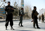 <p>Afghan policemen keep watch at the site of a suicide attack in Kabul, Afghanistan, Dec. 28, 2017. (Photo: Omar Sobhani/Reuters) </p>