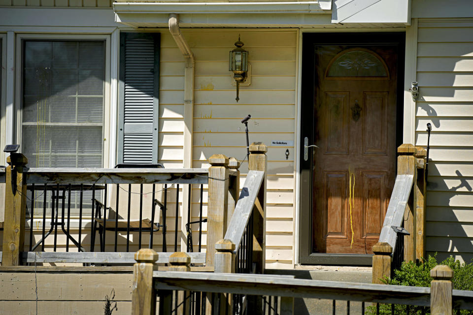 Dried egg on the front of a house. (Charlie Riedel / AP)