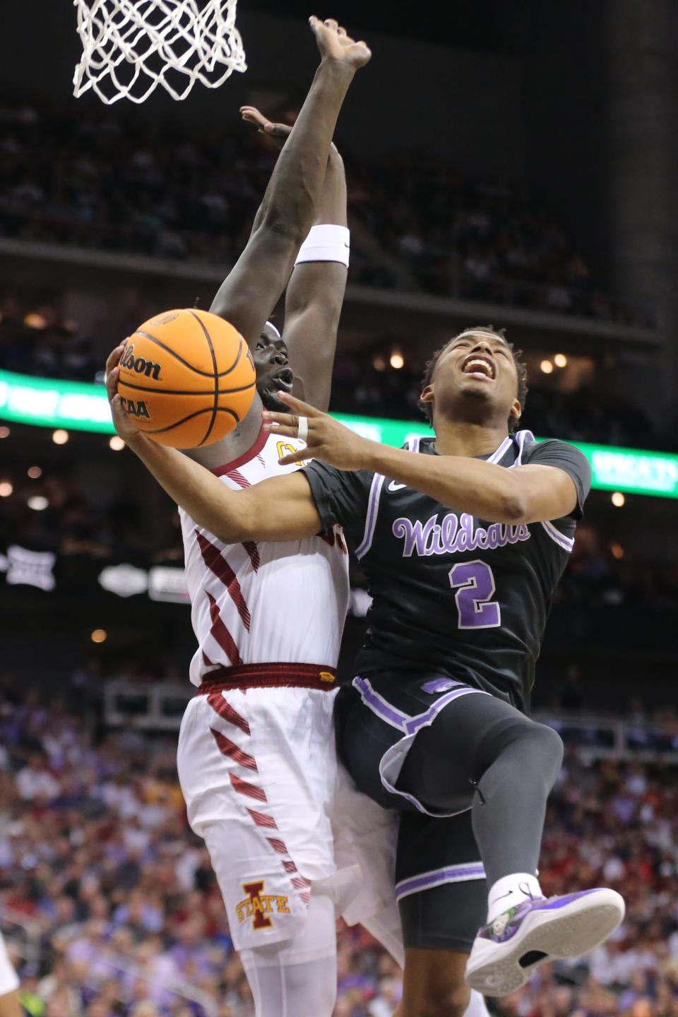 Kansas State guard Tylor Perry (2) attempts a layup against Iowa State's Omaha Biliew (33) during their Big 12 Tournament quarterfinal on Thursday at T-Mobile Center. Perry will lead the Wildcats against Iowa on Tuesday in a first-round NIT game in Iowa City.