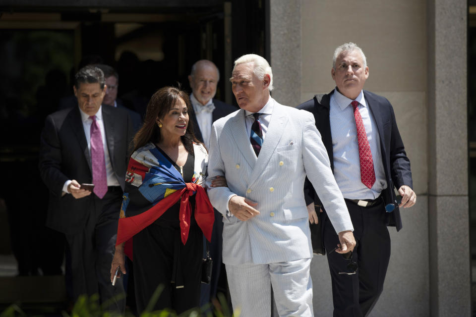 Roger Stone, a longtime confidant of President Donald Trump, accompanied by his wife, Nydia Stone, leaves federal court in Washington, Tuesday, July 16, 2019. (AP Photo/Sait Serkan Gurbuz)