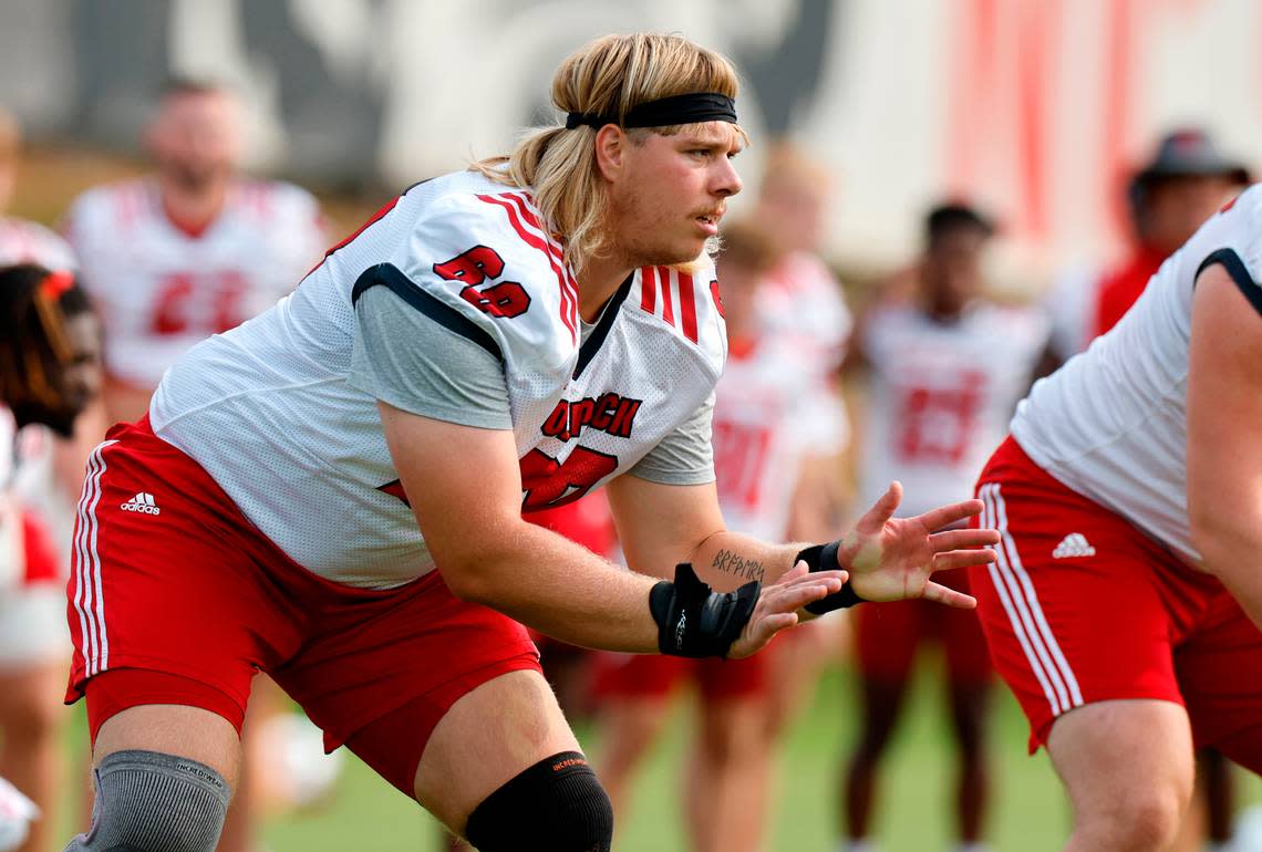 N.C. State offensive lineman Dawson Jaramillo (69) runs a drill during the Wolfpack’s first fall practice in Raleigh, N.C., Wednesday, August 2, 2023. Ethan Hyman/ehyman@newsobserver.com