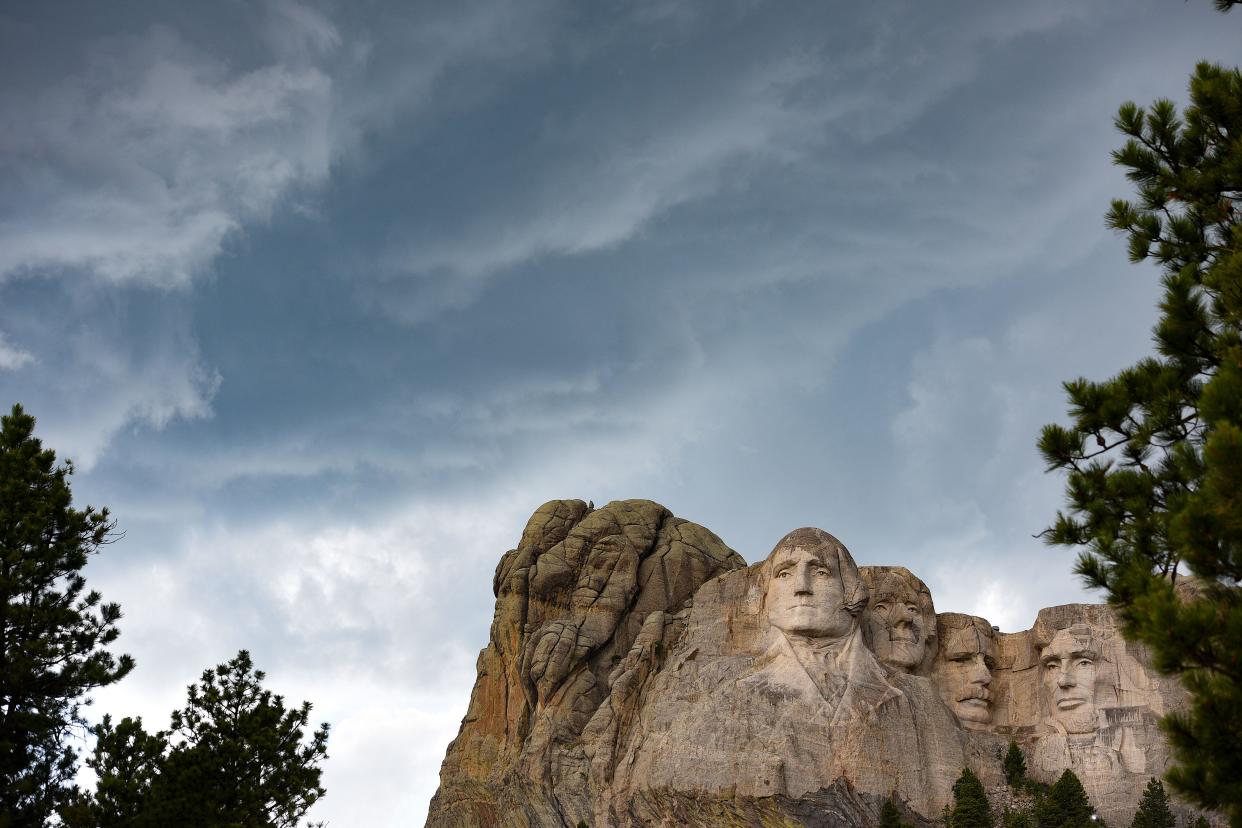 Storm clouds roll in over Mount Rushmore in July 2020.