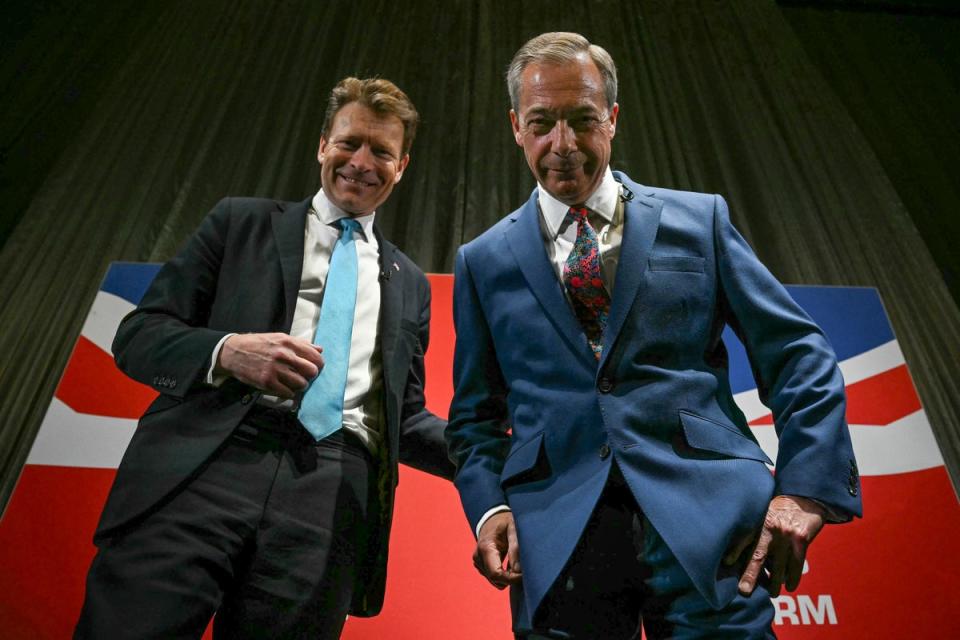 Nigel Farage and Richard Tice took aim at barber shops during the launch of Reform UK’s immigration policy (AFP via Getty Images)