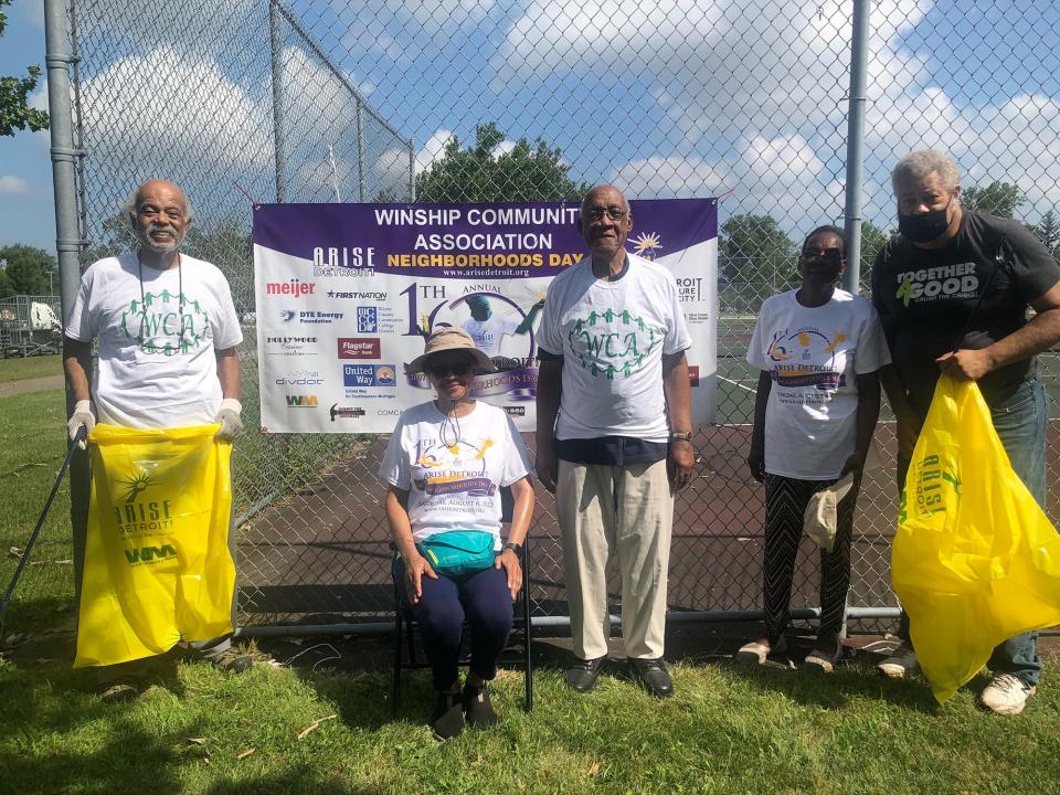 Dr. Arthur Divers, standing in the center, has always enjoyed working with community members across Detroit, which was the case on Aug. 6, 2022, when he came together with members of the Winship Community Association for an ARISE Detroit! Neighborhoods Day event.