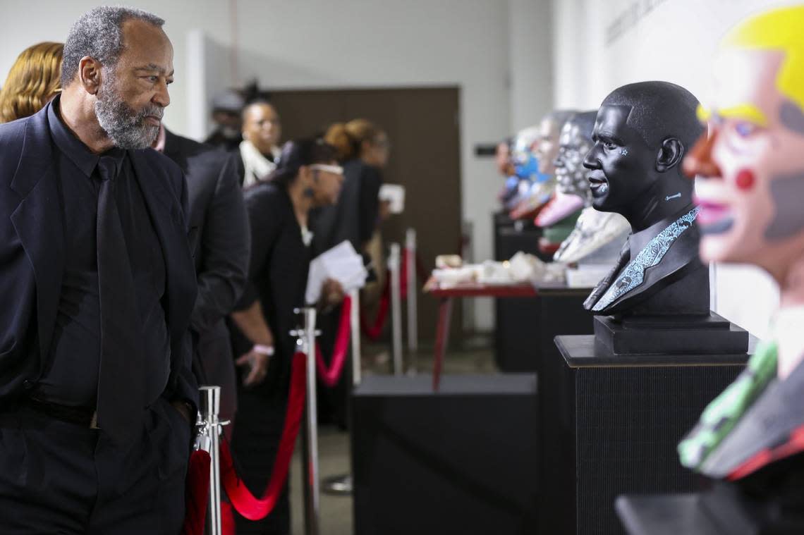 Ron Frazier looks at a bust of Barack Obama during the grand opening of Visions of Our 44th President at The Black Archives Historic Lyric Theater in Overtown on Wednesday, Nov. 30, 2016. The collective sculptural show was created to recognize and celebrate the historical significance of the first African American President of the United States of America, Barack Obama.