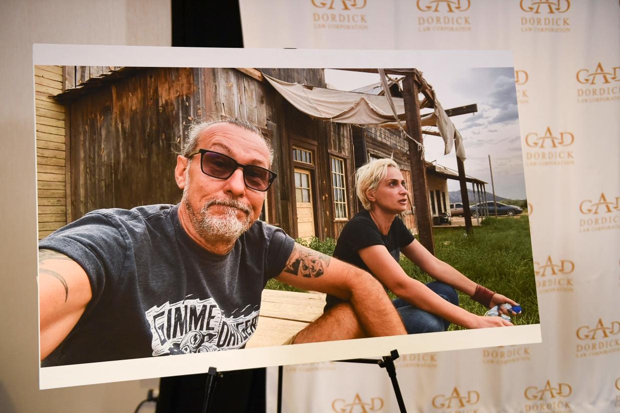 A photo of Serge Svetnoy and Halyna Hutchins is displayed after a press conference with attorney Gary Dordick (not pictured) and Serge Svetnoy, chief lighting technician for the film Rust, about a lawsuit filed after the fatal shooting on the film Rust during a press conference on November 10, 2021 in Los Angeles, California.