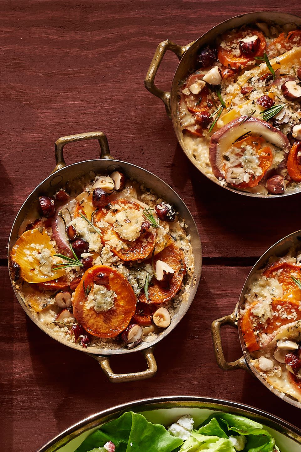 <p>Everybody gets their own individual serving of this earthy dish. We recommend mushroom stock to keep it vegetarian.</p><p><strong><a href="https://www.countryliving.com/food-drinks/recipes/a36646/root-vegetable-gratin/" rel="nofollow noopener" target="_blank" data-ylk="slk:Get the recipe;elm:context_link;itc:0;sec:content-canvas" class="link ">Get the recipe</a>.</strong></p><p><strong><a class="link " href="https://www.amazon.com/Better-than-Bouillon-Mushroom-Base/dp/B00016LA98/?tag=syn-yahoo-20&ascsubtag=%5Bartid%7C10050.g.34470406%5Bsrc%7Cyahoo-us" rel="nofollow noopener" target="_blank" data-ylk="slk:SHOP MUSHROOM STOCK;elm:context_link;itc:0;sec:content-canvas">SHOP MUSHROOM STOCK</a><br></strong></p>