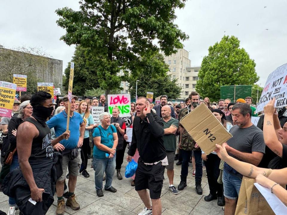 Anti-racism activists gather in Guildhall square to confront far-right protesters after announcing a protest in Plymouth (Anadolu via Getty Images)