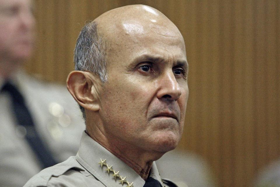 FILE - An Oct. 3, 2012, file photo is of Los Angeles County Sheriff Lee Baca at the Men's Central Jail in downtown Los Angeles. A law enforcement official says the embattled sheriff will announce his retirement Tuesday, Jan. 7, 2014. (AP Photo/Reed Saxon, File)