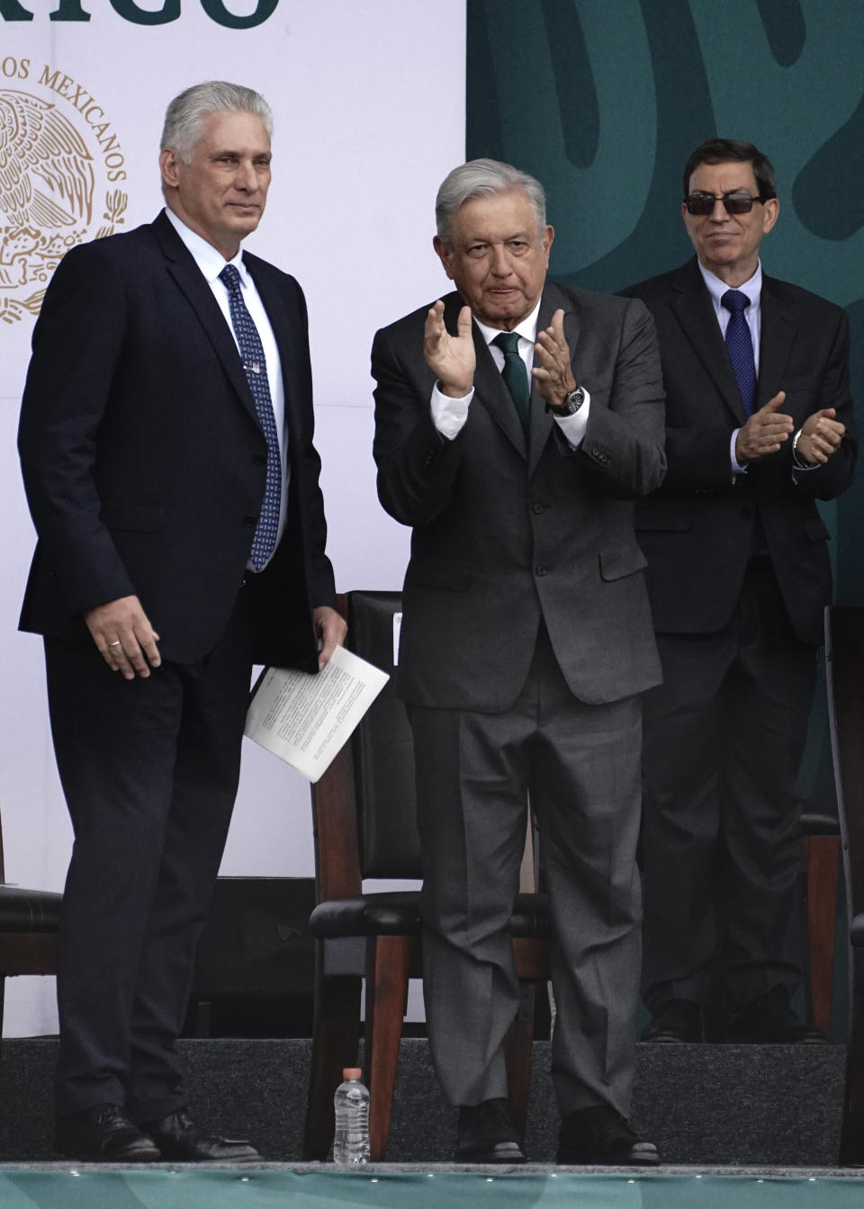 Cuba's President Miguel Diaz-Canel, left, accompanies Mexico's President Andres Manuel Lopez Obrador, during Independence Day celebrations, in the Zocalo in Mexico City, Thursday, Sept. 16, 2021. (AP Photo/Marco Ugarte)