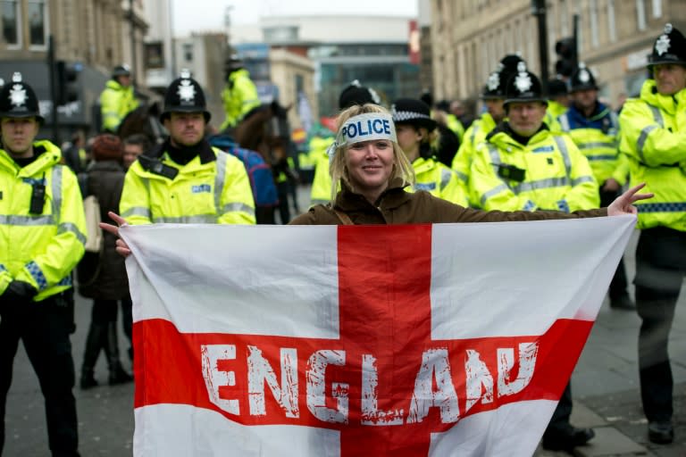 A protester at a demonstration in Newcastle in February by the UK branch of the German group 'Pegida', which opposes what it calls the "Islamisation" of Europe