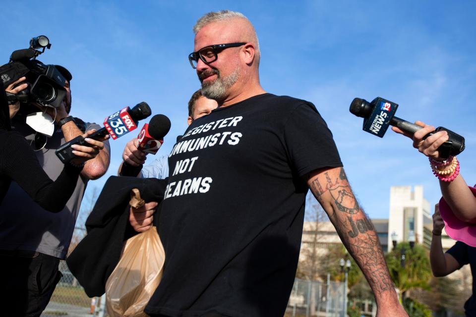 Proud Boys organizer Joseph Biggs walks from the George C. Young Federal Annex Courthouse in Orlando, Fla., on Jan. 20, 2021, after a court hearing regarding his involvement in riot at the U.S. Capitol on Jan. 6, 2021.