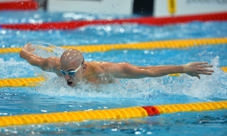 Hungary's Laszlo Cseh competes on his way to winning the final of the men's 100m Butterfly swimming event on Day 13 of the European aquatics championships in London on May 21, 2016