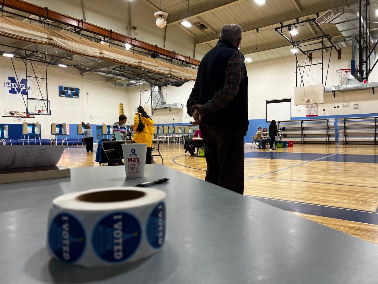 A steady stream of voters cast ballots at Gaudet Middle School in Middletown Tuesday morning.