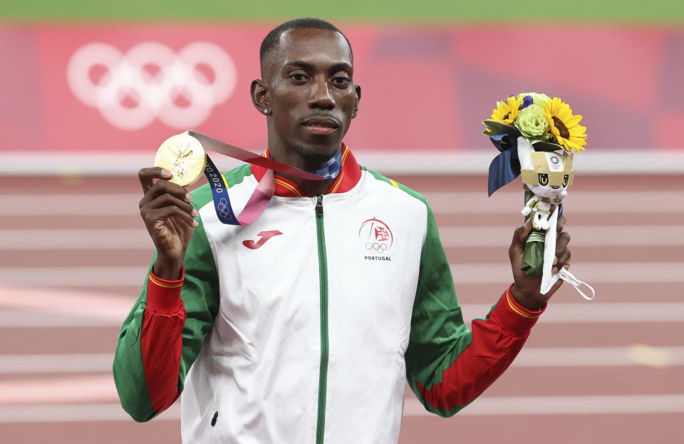 Pedro Pichardo of Portugal with gold medal