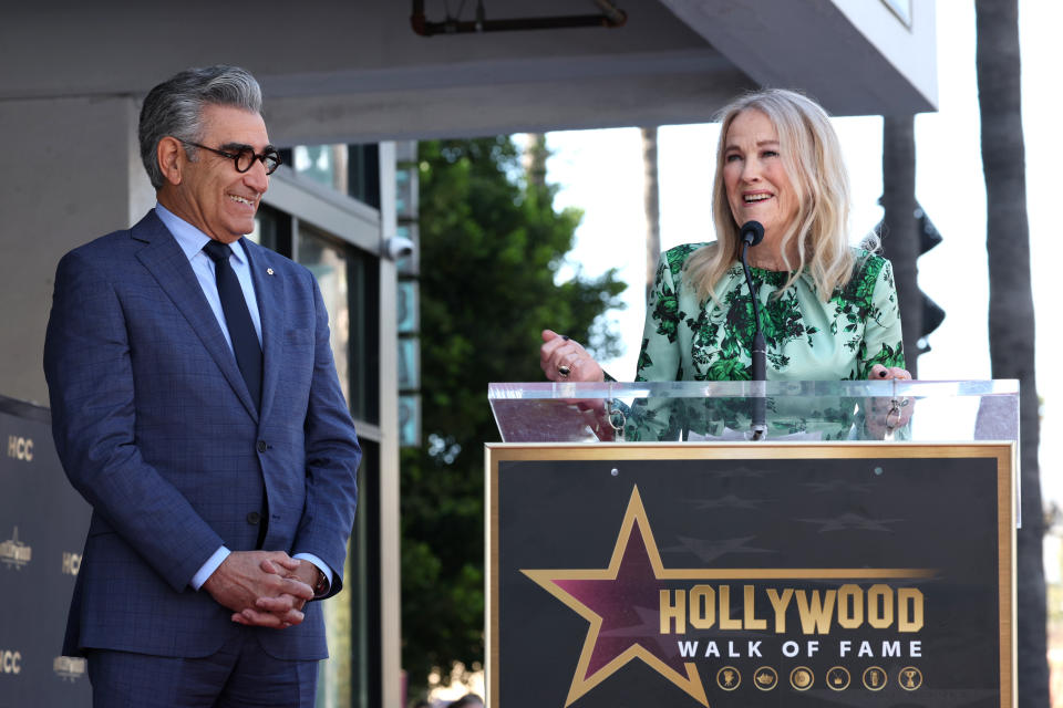 HOLLYWOOD, CALIFORNIA - MARCH 08: Eugene Levy (L) and Catherine O'Hara attend Eugene Levy's Hollywood Walk of Fame Star ceremony, celebrating the accomplished actor and host of Apple TV+’s “The Reluctant Traveler With Eugene Levy