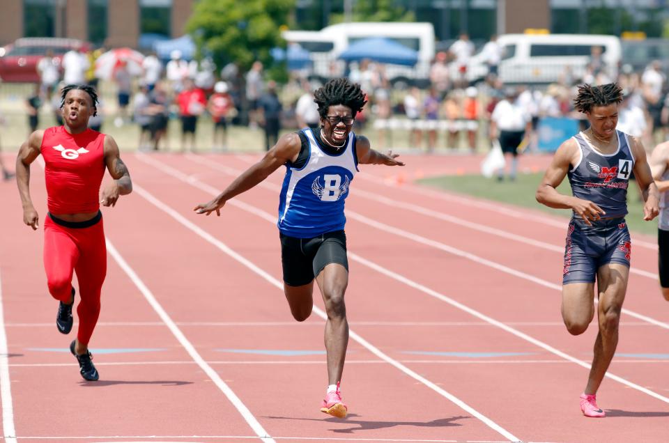 Marion-Franklin's Dawayne Galloway, right, finishes second to Bexley's Mason Louis in the 200 in the Division II state meet last year.