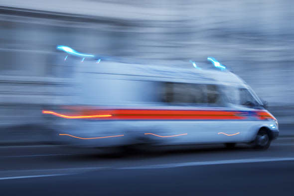 Police Car or Ambulance Speeding, Blurred Motion