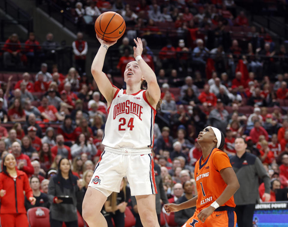 Ohio State guard Taylor Mikesell (24) shoots in front of Illinois guard Genesis Bryant (1) during the second half of an NCAA college basketball game in Columbus, Ohio, Sunday, Jan. 8, 2023. (AP Photo/Paul Vernon)